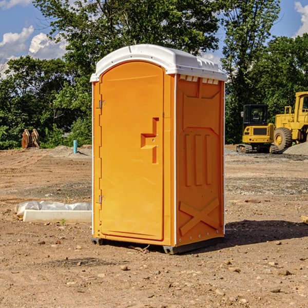 how often are the porta potties cleaned and serviced during a rental period in Freeland